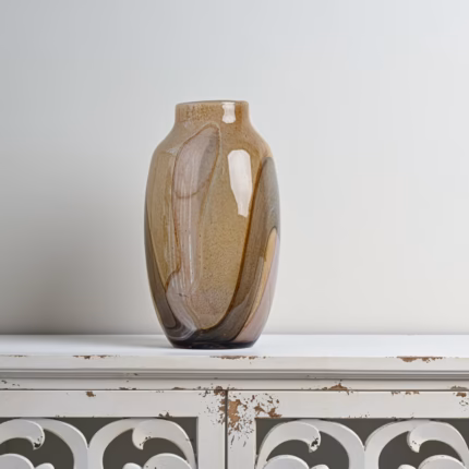 If you are looking for a stylish decorative vase in Kenya or Nairobi, this abstract ceramic vase is a beautiful choice for modern home décor. Its warm brown, beige and neutral tones make it easy to pair with different interior styles. It can be used as a decorative accent on a console table, TV stand, bookshelf, sideboard, entryway table or bedroom dresser. It is ideal for homeowners in Nairobi looking for elegant, unique and modern home décor accessories that add warmth and personality to their space.